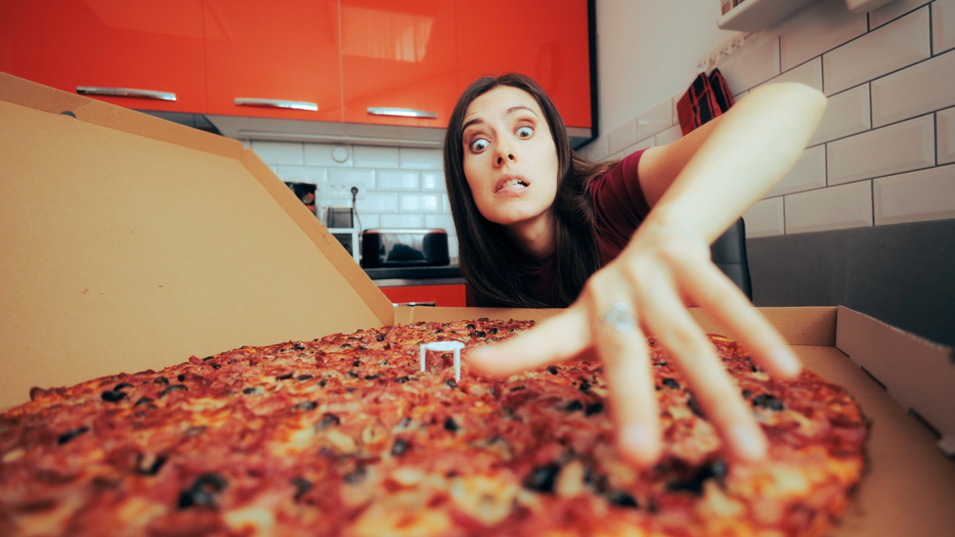 Mujer adicta a la pizza